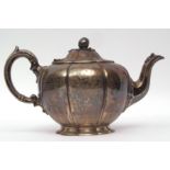 Victorian melon shaped tea pot of typical lobed form with cast and applied finial on a shaped