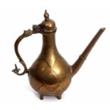 Late 18th/early 19th century Mughal Islamic bronze ewer with biting snake handle and Islamic