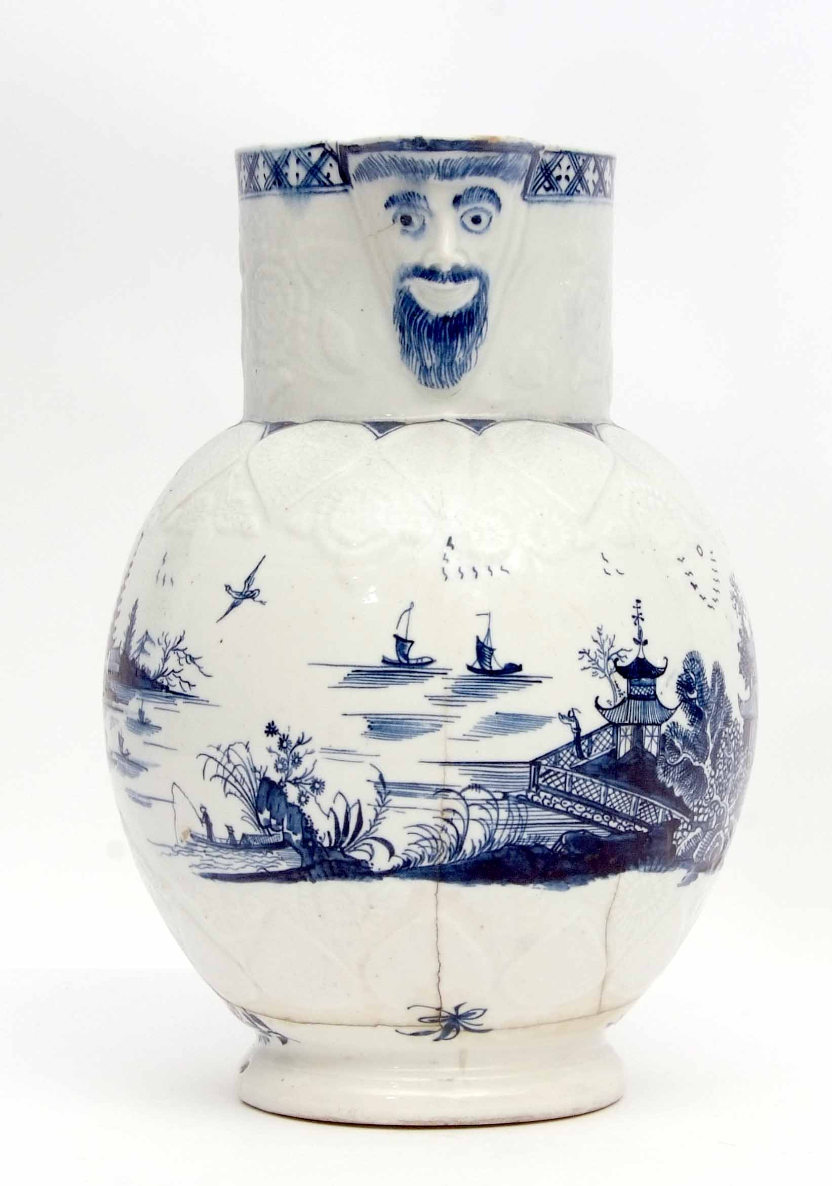 Rare Lowestoft mask jug, the moulded body decorated with pagodas and Chinese island scenes, the - Image 2 of 5