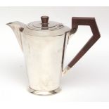 George VI hot water pot, in the Art Deco manner, with hinged cover, tapering polished body and