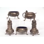 George V five piece cruet set comprising pepper casters, open salts, and lidded mustard, the