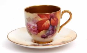 Early 20th century Royal Worcester cup and saucer decorated with flowers and blackberries, the