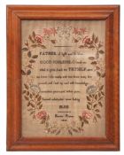 Early 19th century sampler, central religious verse flanked by a floral border on gauze in a maple