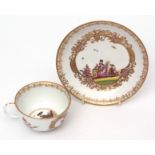 Meissen chinoiserie cup and saucer, possibly designed by J G Horoldt with chinoiserie figures in