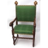 19th century throne chair, two uprights decorated with gilded foliate and c-scroll mounts, green