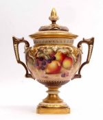 Royal Worcester vase and cover, the bulbous body richly decorated with fruit on a mossy ground by