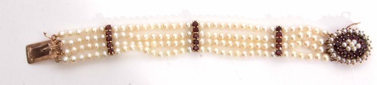 Vintage cultured pearl and garnet bracelet, design of four rows of pearls joined by three bars, each