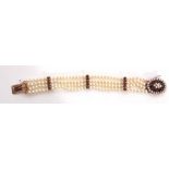 Vintage cultured pearl and garnet bracelet, design of four rows of pearls joined by three bars, each