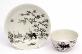 Worcester tea bowl and saucer circa 1756-58 with black pencilled decoration of the boy on a