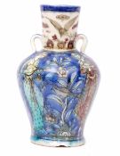 Persian Qajar vase, late 19th century, the neck with loop handles, decorated in typical fashion with