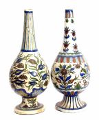 Two Iznik or Qajar bottle vases or water sprinklers, both decorated in a typical palette and fashion
