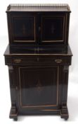 Late 19th century ebonised ladies desk with parcel gilded detail throughout, the top with a brass