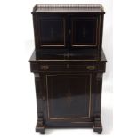 Late 19th century ebonised ladies desk with parcel gilded detail throughout, the top with a brass