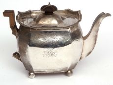 George III teapot of shaped rectangular form with flared rim, hinged and domed cover and engraved