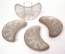 Group of eight demi-lune dishes by R Lalique, with the Pissenlit (dandelion) pattern