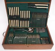 Early 20th century oak cased canteen of cutlery and flatware, Hanoverian rat-tail pattern for 12