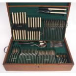 Early 20th century oak cased canteen of cutlery and flatware, Hanoverian rat-tail pattern for 12