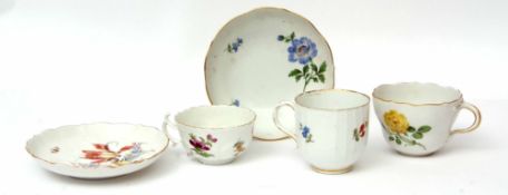 Group of Meissen wares comprising an 18th century coffee cup with Tau handle decorated with Deutsche