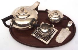 First half of 20th century Far Eastern white metal five-piece tea set comprising tea pot and