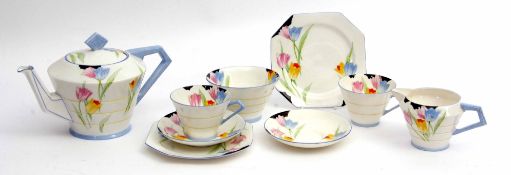 Art Deco shape tea for two by Paragon China, the set decorated with flowers and black highlights