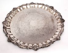 Late 19th century electro-plated large circular salver, with cast and applied C-scroll and foliate