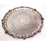 Late 19th century electro-plated large circular salver, with cast and applied C-scroll and foliate