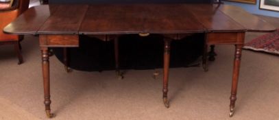 Late 18th/early 19th century mahogany D-end dining table, two central leaves over a concertina