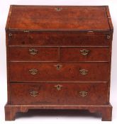 Early 18th century walnut bureau, fall front enclosing a fitted interior of drawers, pigeonholes and