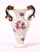 Miniature vase with fish handles, probably Meissen, circa 1760, the moulded vase decorated with