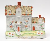 Staffordshire model of a house with the title "Potash Farm" in gilt to base (Potash Farm was the