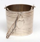 Late 19th century Russian silver tea strainer modelled in the form of a pail with hinged strap