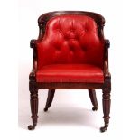 Late Regency period mahogany desk chair, arched back and slightly splayed arms terminating in