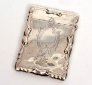 Edward VII card case of hinged rectangular form with C-scroll borders and engraved body with