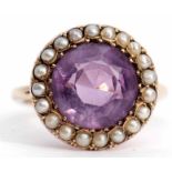 Amethyst and seed pearl ring, the circular cut faceted amethyst (10mm diam) set within a surround of