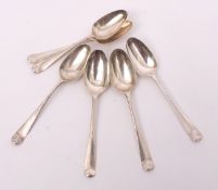 Mixed Lot: four George III bottom struck Hanoverian pattern dessert spoons with long drop bowls (