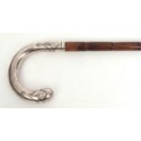 Early 20th century Continental silver handled bamboo walking stick, the crook shaped handle with