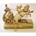 Very large Royal Dux figure of a Roman charioteer riding a chariot with two horses rearing up in