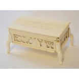 Early 20th century African ivory dressing table casket of rectangular form with hinged cover and