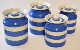 Group of T G Green Cornish kitchen ware jars and covers with a blue circular design