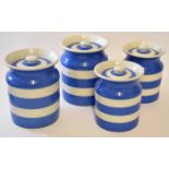 Group of T G Green Cornish kitchen ware jars and covers with a blue circular design