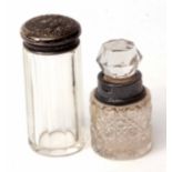 Mixed Lot: two various silver mounted and clear cut glass toiletry bottles, the first of cylindrical