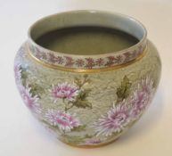 Late 19th century Doulton Slater's patent jardiniere decorated with pink flowerheads on a green