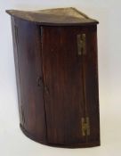 18th century oak wall mounting bow fronted corner cupboard, with fitted shelving, 52cm wide