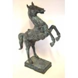 Reproduction tarnished bronze effect model of a rearing horse, 96cm high