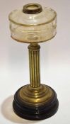 Black ceramic brass and cut clear glass oil lamp stand and reservoir of circular waisted base to a