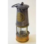 Early 20th century steel and lacquered brass miner's lamp "Protector Lamp & Lighting Co Ltd -