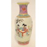 Chinese porcelain baluster vase with polychrome decoration of a family gathered by a table in a