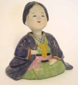Oriental pottery figure of a lady in brown and green glazes, 16cm high