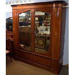 Edwardian harlequin matched mahogany inlaid bedroom suite comprising a large mirror door wardrobe,