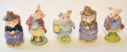 Group of Beswick wares modelled mainly as pigs in various poses, including "And this pig had none"